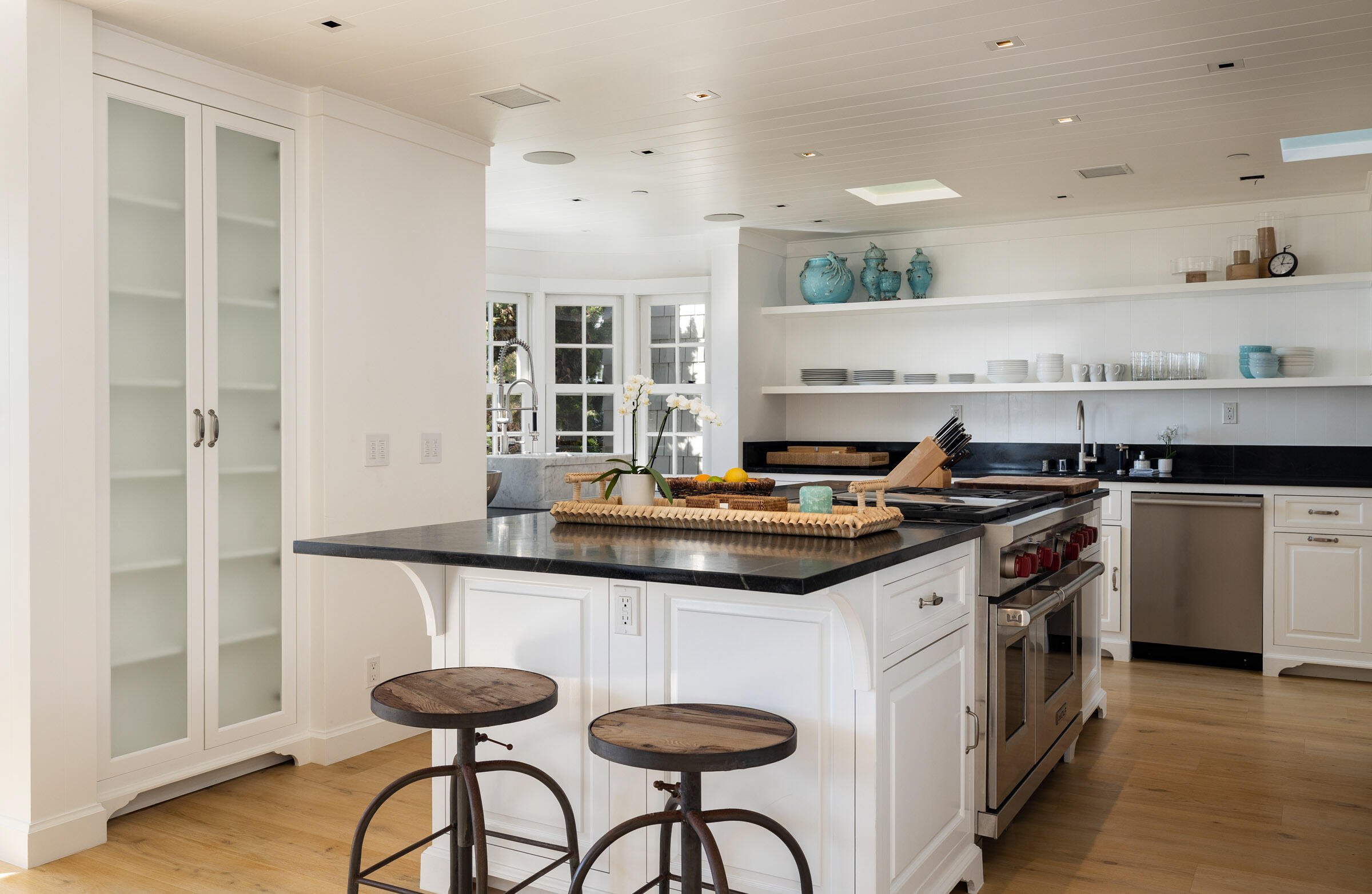 571 Sand Point Road Carpinteria, CA 93013 - Photo 14 of 49 a kitchen with stainless steel appliances granite countertop a stove and a refrigerator