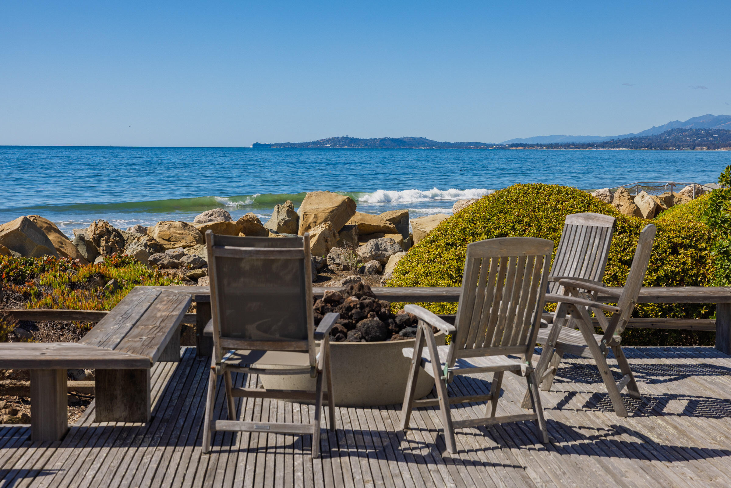 571 Sand Point Road Carpinteria, CA 93013 - Photo 2 of 49 a view of a chairs and table on the wooden floor