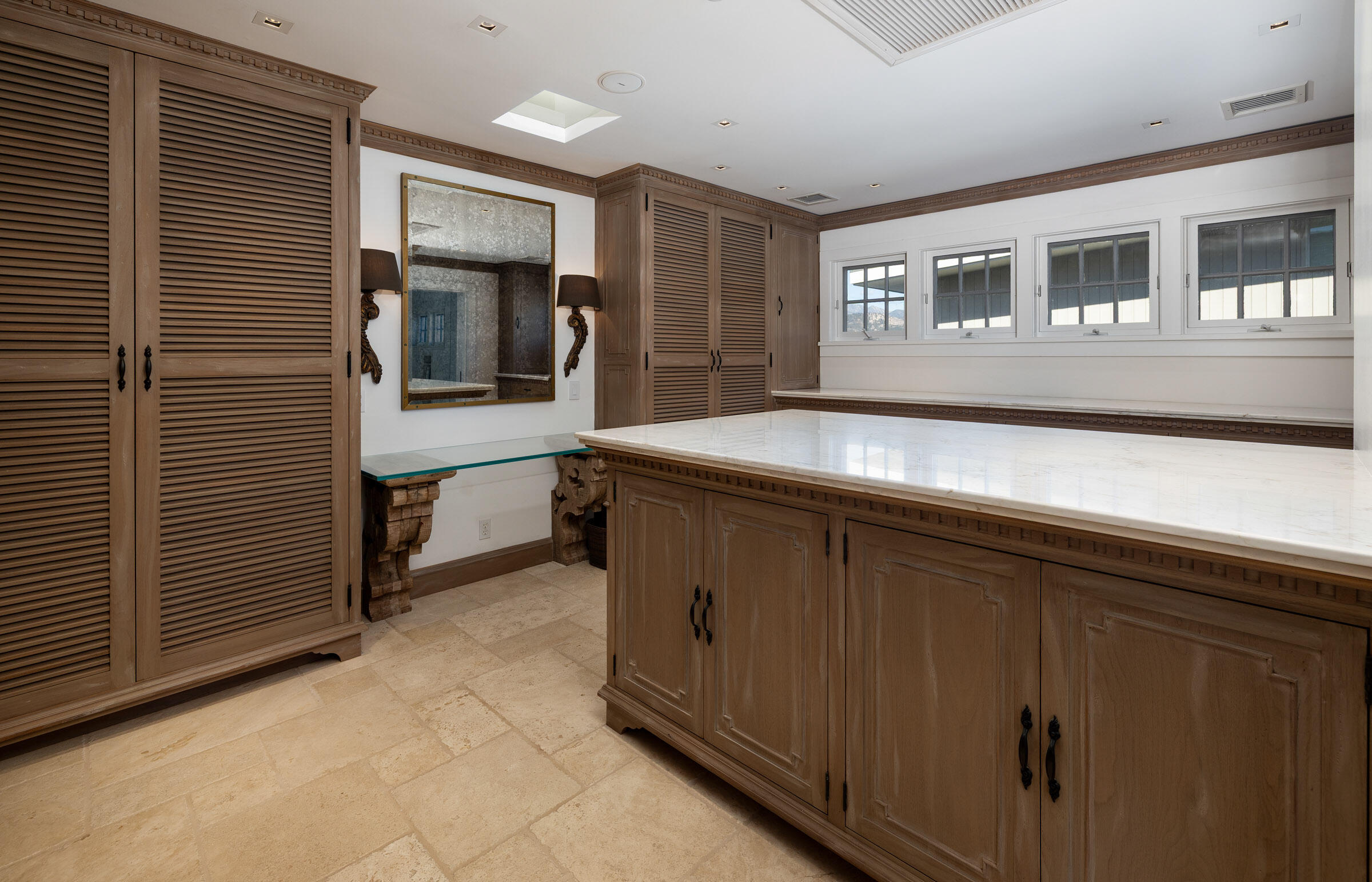 571 Sand Point Road Carpinteria, CA 93013 - Photo 24 of 49 a kitchen with a refrigerator and a sink