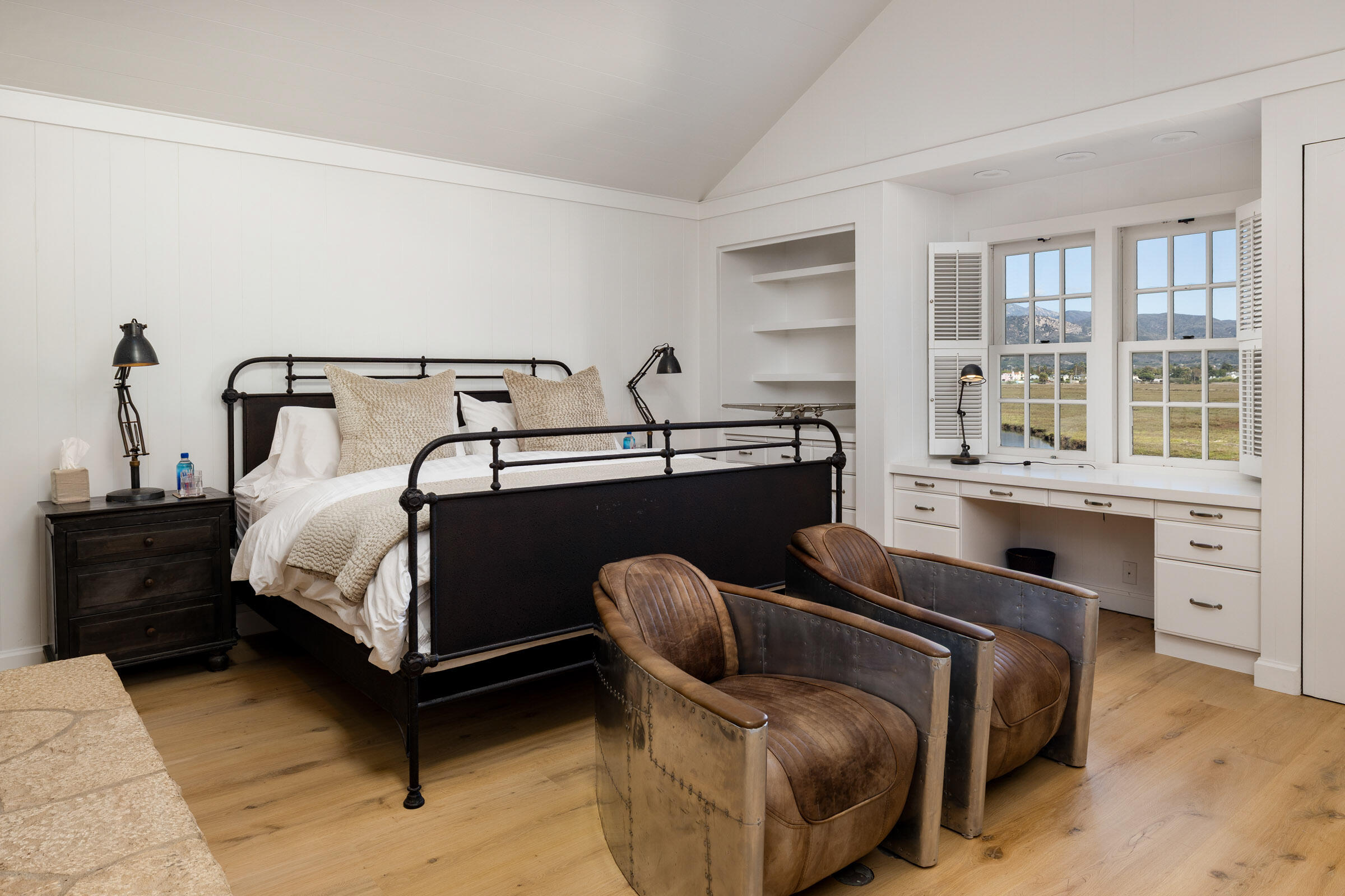 571 Sand Point Road Carpinteria, CA 93013 - Photo 29 of 49 a bedroom with furniture and windows