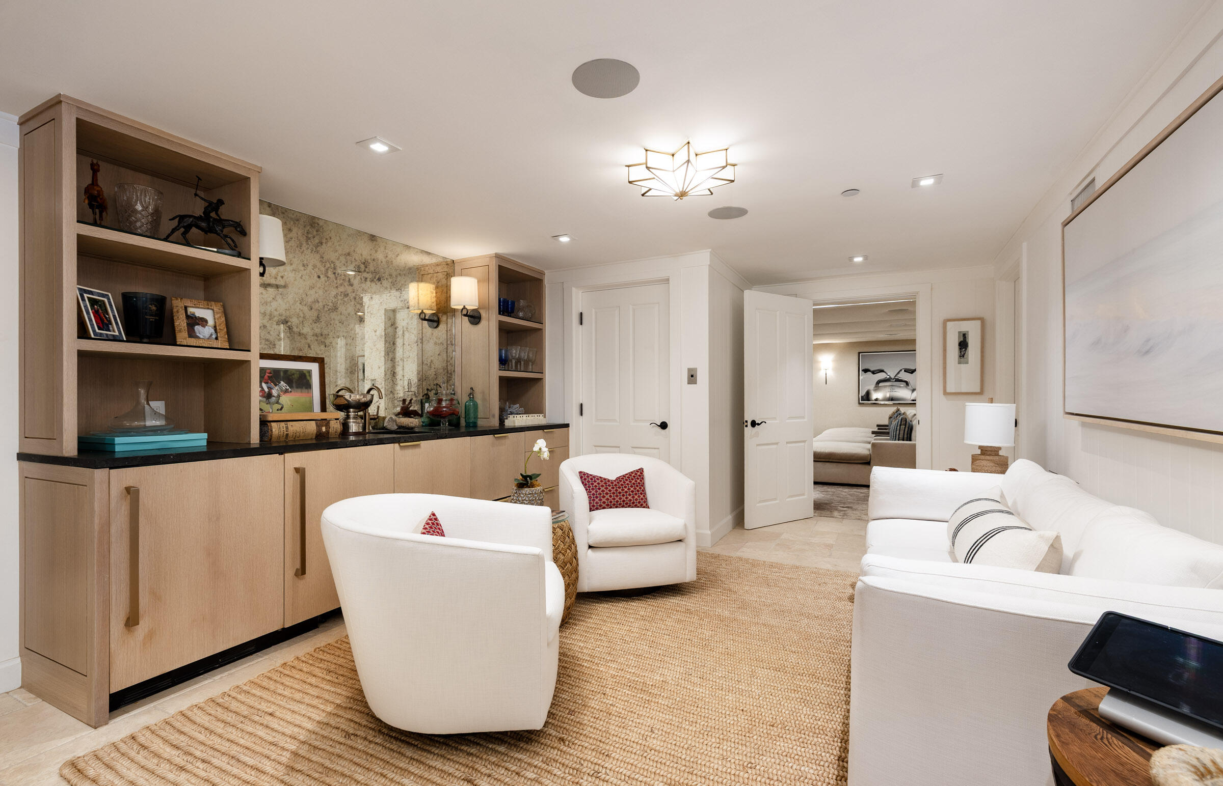 571 Sand Point Road Carpinteria, CA 93013 - Photo 36 of 49 a living room with furniture and a chandelier