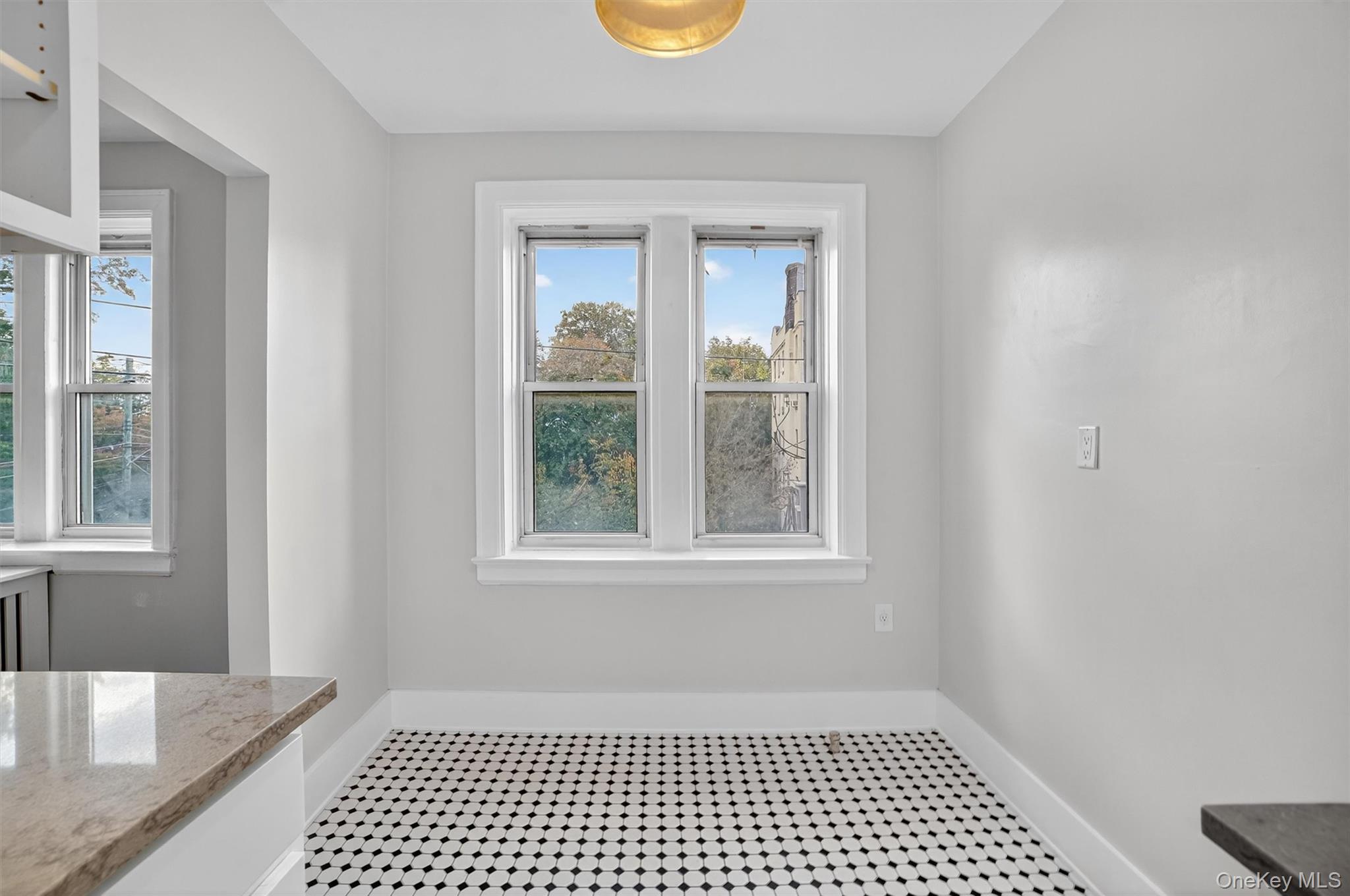 294 Bronxville Road, Unit 4C Bronxville, NY 10708 - Photo 17 of 26 a view of a room with wooden floor and a window