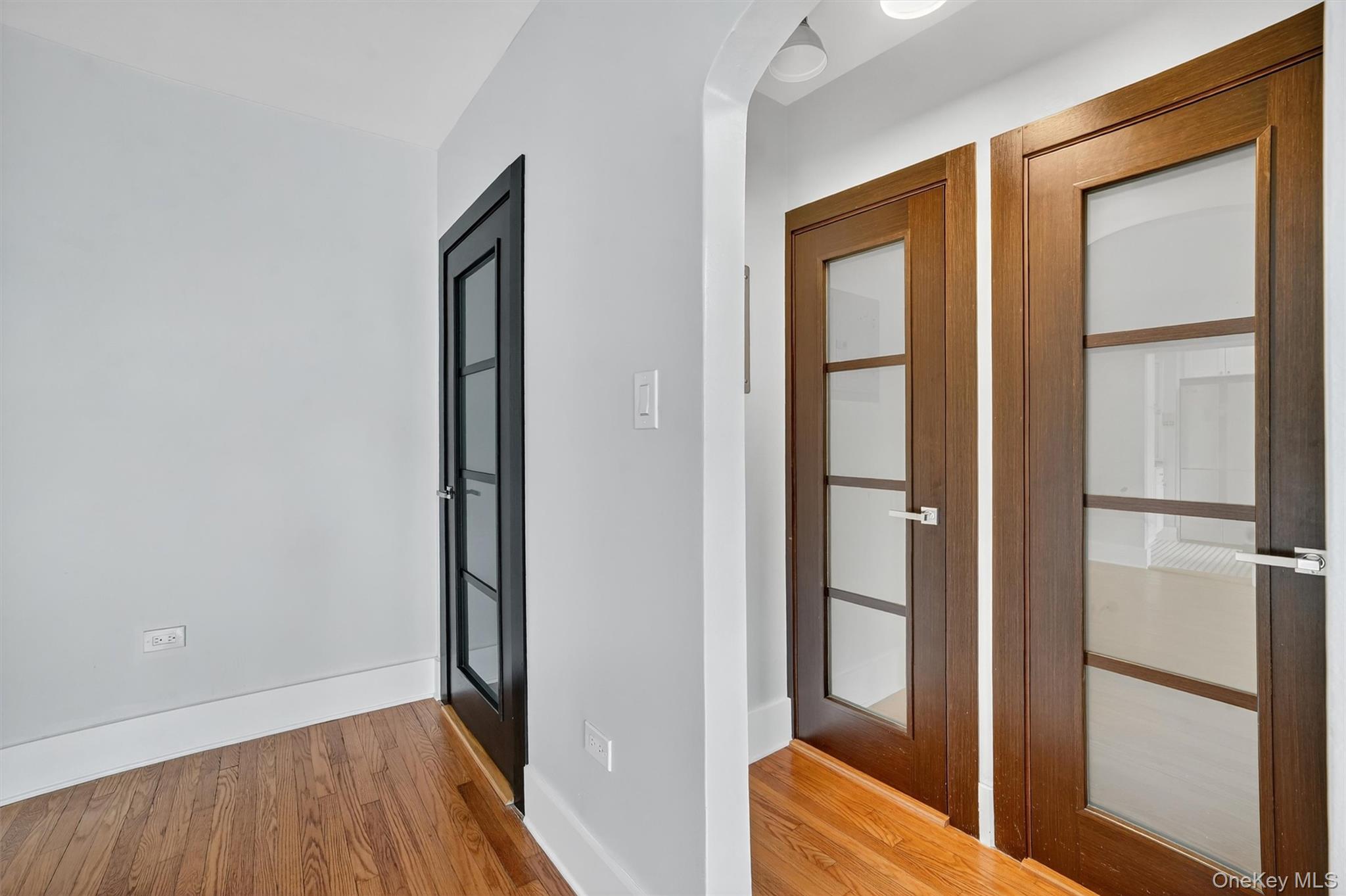 294 Bronxville Road, Unit 4C Bronxville, NY 10708 - Photo 20 of 26 a view of hallway with wooden floor