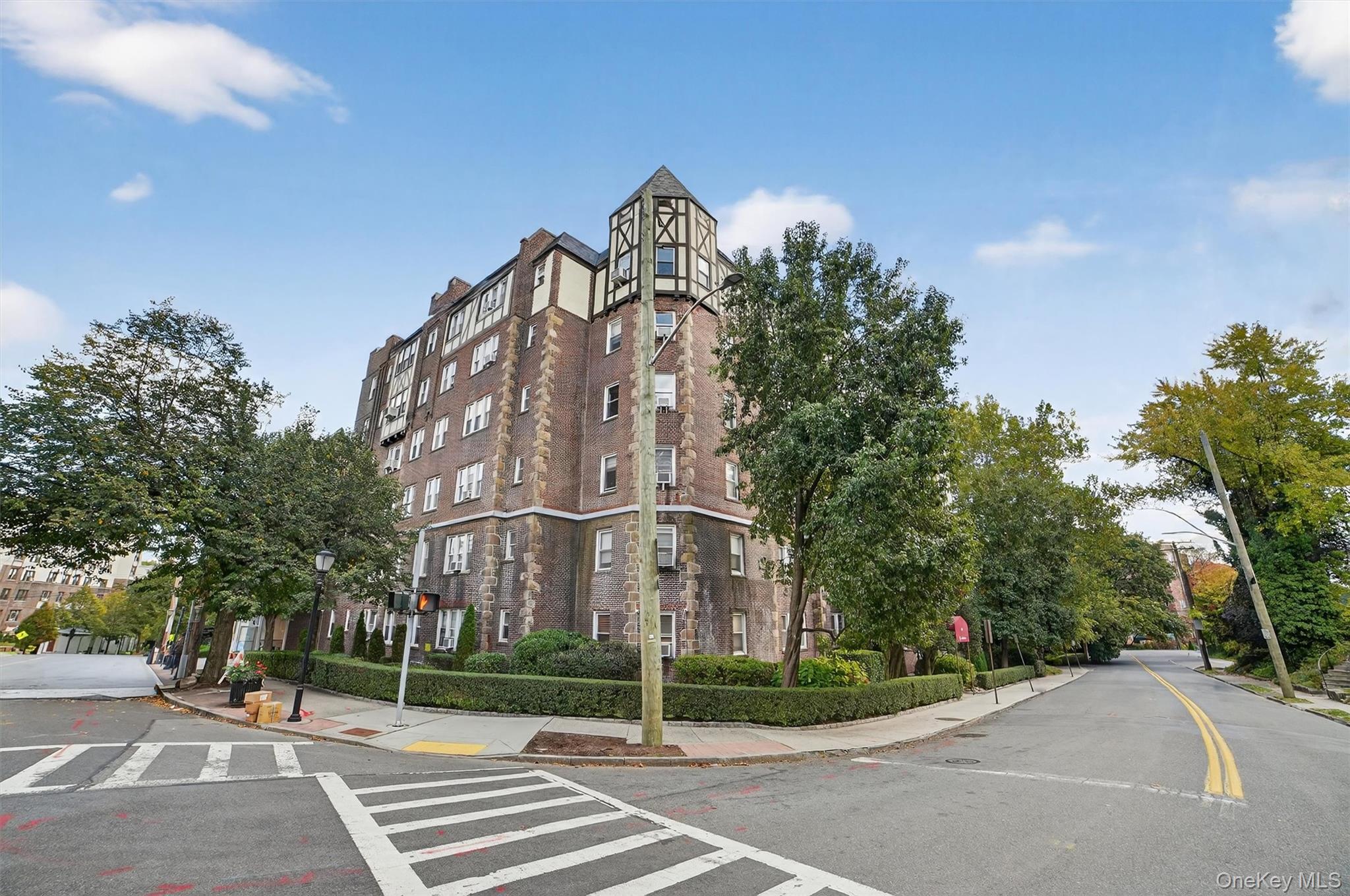 294 Bronxville Road, Unit 4C Bronxville, NY 10708 - Photo 26 of 26 a view of a building with a yard