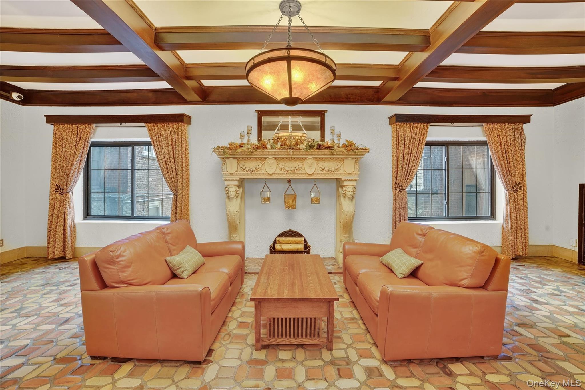 294 Bronxville Road, Unit 4C Bronxville, NY 10708 - Photo 5 of 26 a living room with furniture a fireplace and a rug