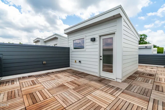 a front view of a house with a garage