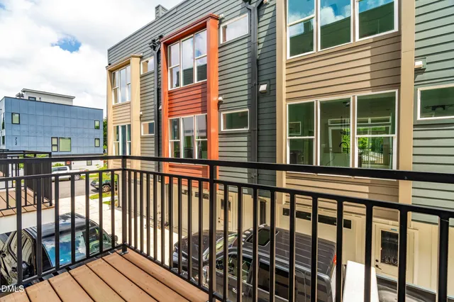 a view of a brick building from a balcony