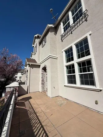 a view of swimming pool with outdoor seating