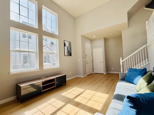a view of livingroom with furniture and windows