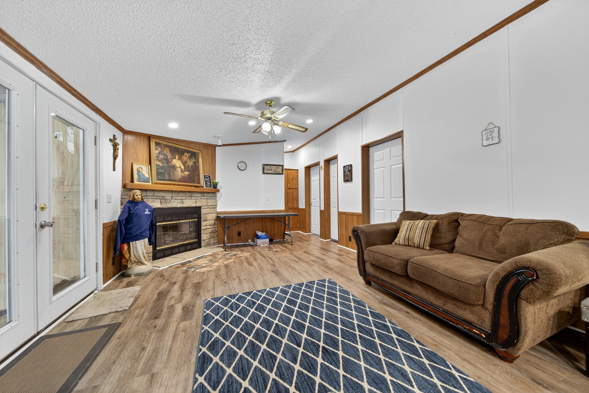 2600 Round Hill Road Lewisburg, TN 37091 - Photo 29 of 100 a living room with furniture a fireplace and a flat screen tv