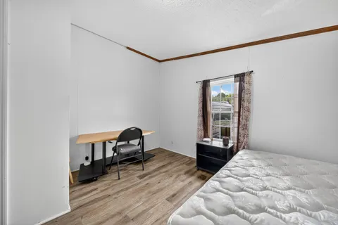 an aerial view of a house with a garden