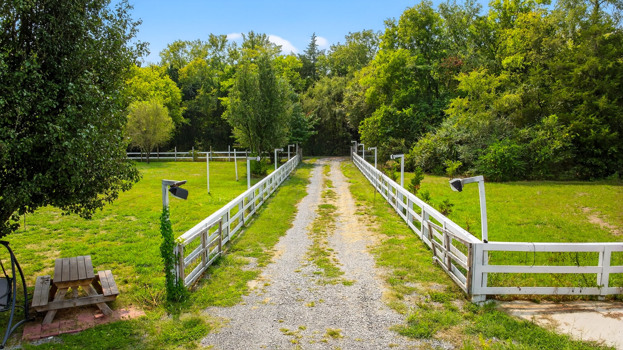 2600 Round Hill Road Lewisburg, TN 37091 - Photo 97 of 100 a view of a swimming pool with a patio and yard of the house
