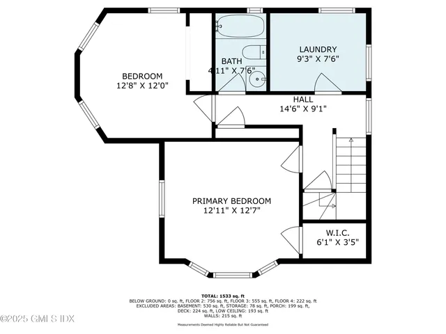 a picture of a bench in front of a wall