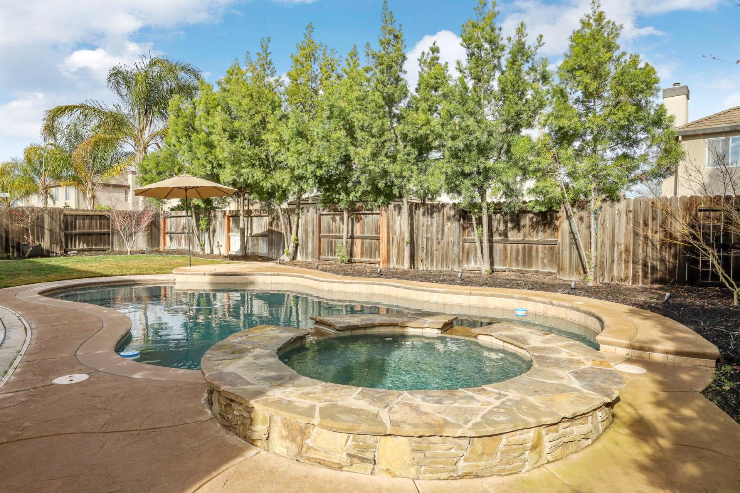 565 Bodeson Court Ripon, CA 95366 - Photo 54 of 65 a view of swimming pool with seating space