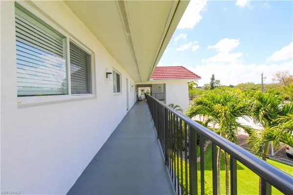 a view of a car parked in front of a building