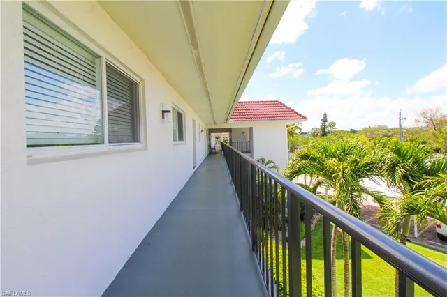 a view of a car parked in front of a building