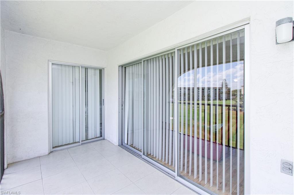 41 High Point Circle South, Unit 303 Naples, FL 34103 - Photo 7 of 39 a view of a balcony