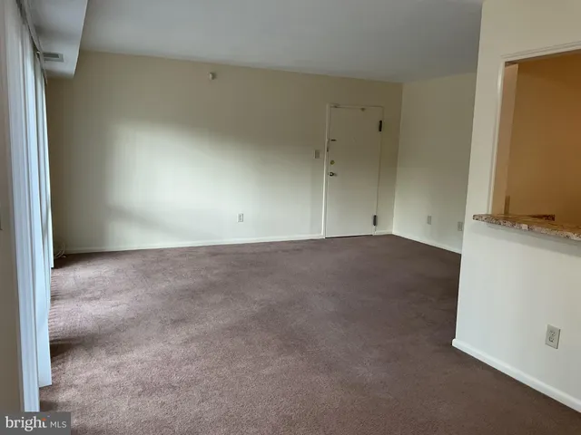 an empty room with an entryway
