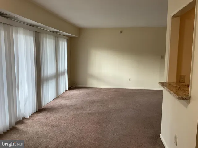 a view of a room with a fireplace