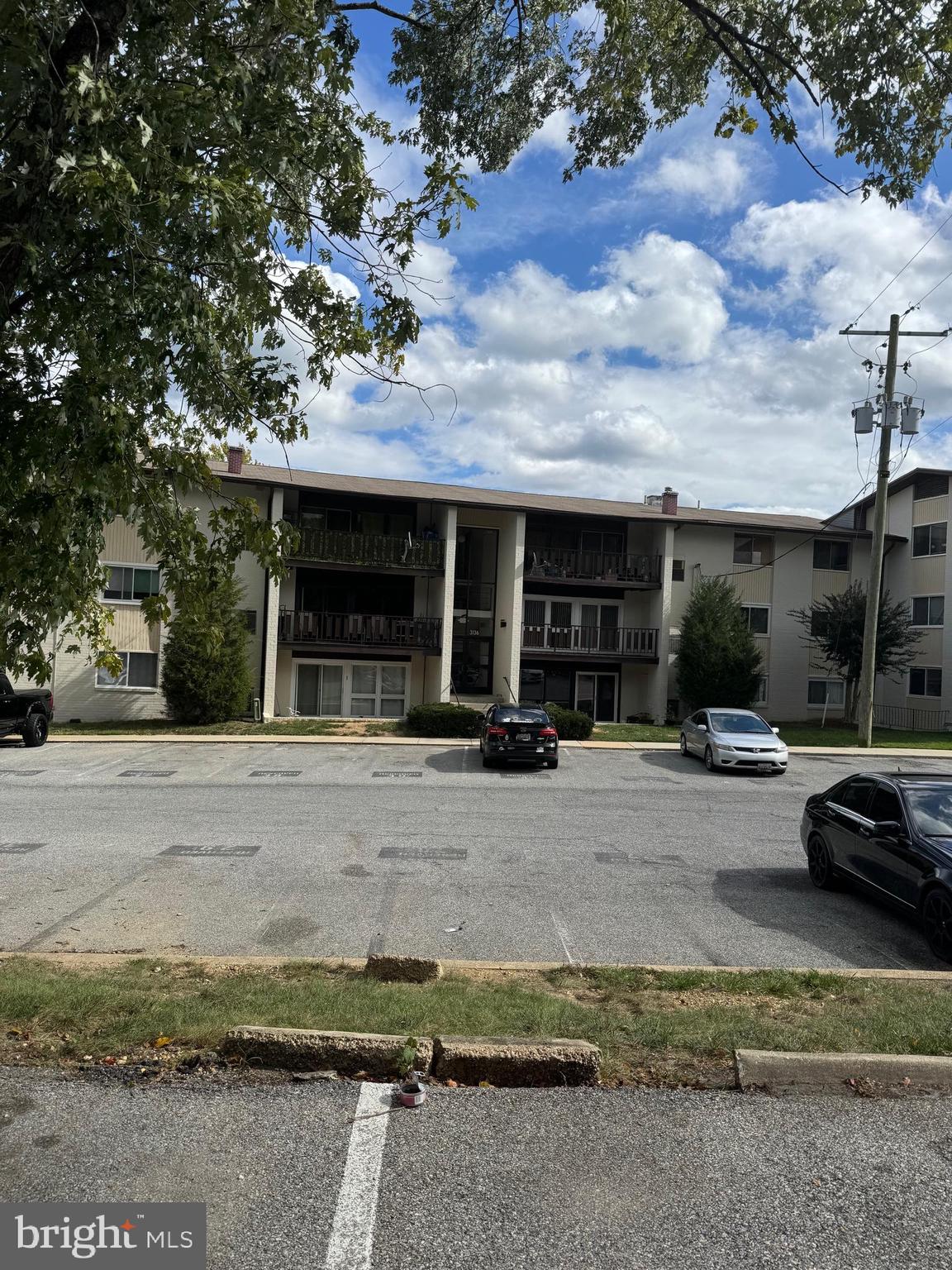 3136 Brinkley Road, Unit 204 Temple Hills, MD 20748 - Photo 19 of 19 a view of a car park in front of house