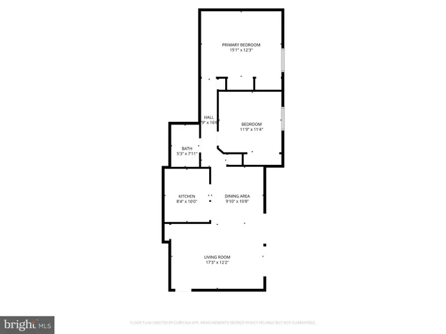 a picture of a bench in front of gate