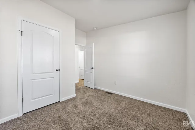 a view of a livingroom with wooden floor