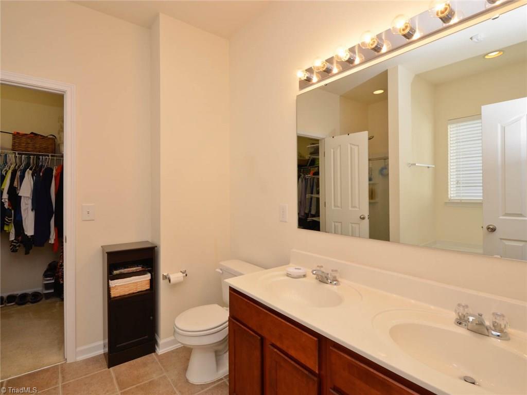 815 Hartley Hill Court High Point, NC 27265 - Photo 11 of 23 Master Bath with double sinks and walk in closet.