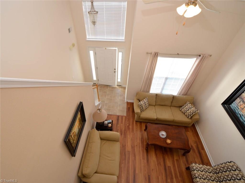 815 Hartley Hill Court High Point, NC 27265 - Photo 14 of 23 Looking down from second floor into entryway and formal living room.