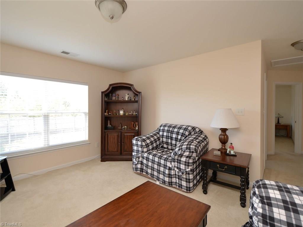 815 Hartley Hill Court High Point, NC 27265 - Photo 18 of 23 Bonus room with lots of natural lighting.