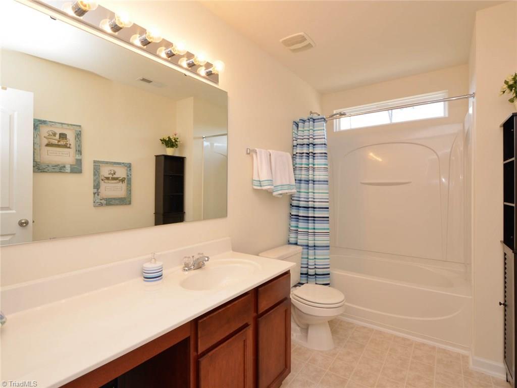 815 Hartley Hill Court High Point, NC 27265 - Photo 20 of 23 Full Bath with lots of vanity and tub on Second floor.