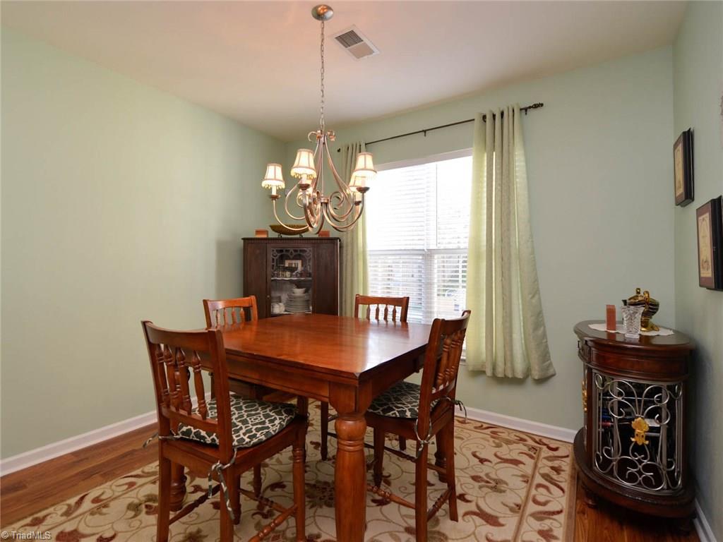 815 Hartley Hill Court High Point, NC 27265 - Photo 5 of 23 Formal dining room with hardwoods.