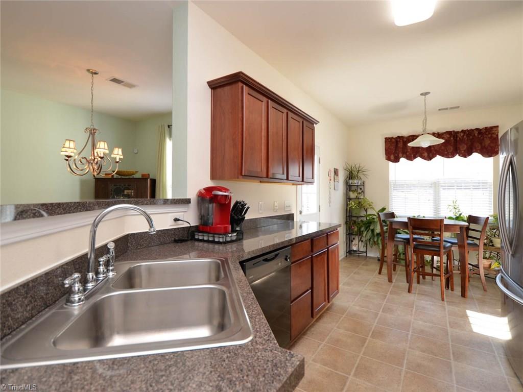 815 Hartley Hill Court High Point, NC 27265 - Photo 8 of 23 You will love the open kitchen with breakfast area.
