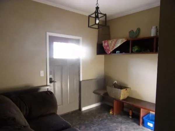 a bathroom with a sink a toilet and shower curtain