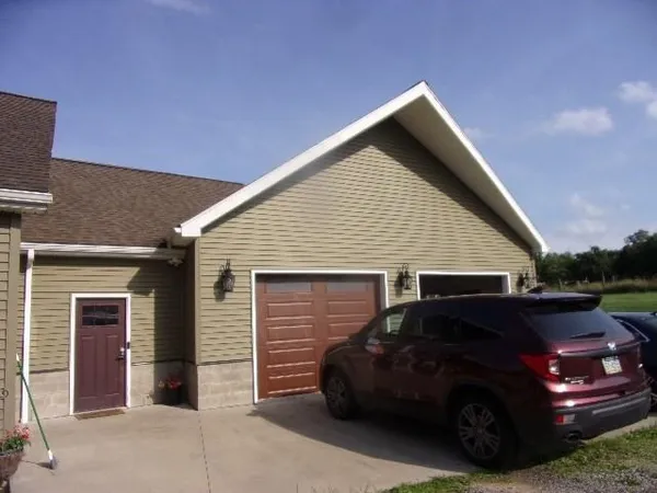 a car parked in front of a house