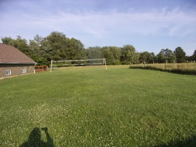 a view of a balcony with a swing