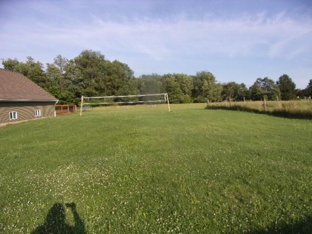 193 Monterey Road Rimersburg, PA 16248 - Photo 23 of 27 a view of a lake with houses in the background
