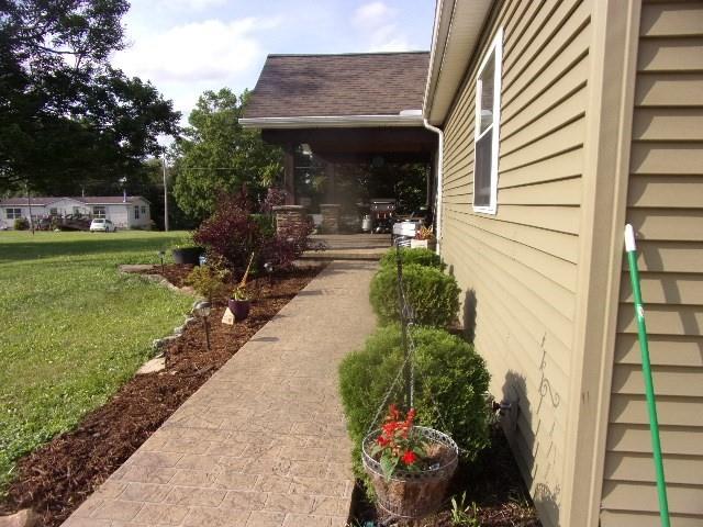193 Monterey Road Rimersburg, PA 16248 - Photo 4 of 27 a view of a porch with potted plants