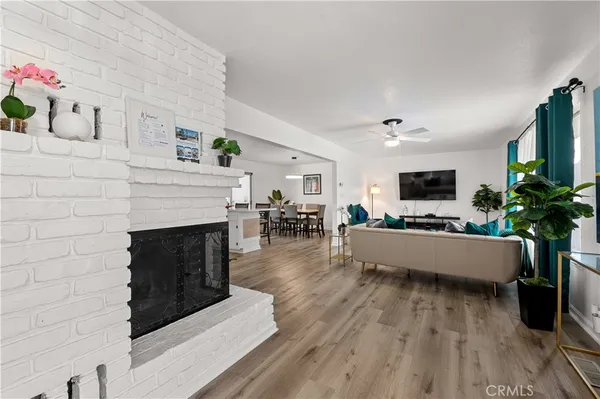a kitchen with a sink cabinets and window