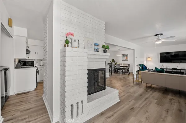 a kitchen with stainless steel appliances a refrigerator and a stove