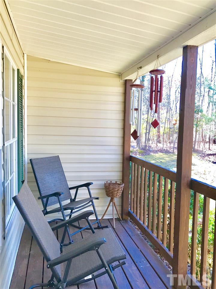 6916 Matthews Road Durham, NC 27712 - Photo 3 of 24 a view of a chairs in balcony