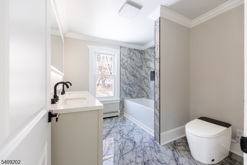 431 North Main Street Wharton, NJ 07885 - Photo 12 of 47 a bathroom with a sink toilet and shower