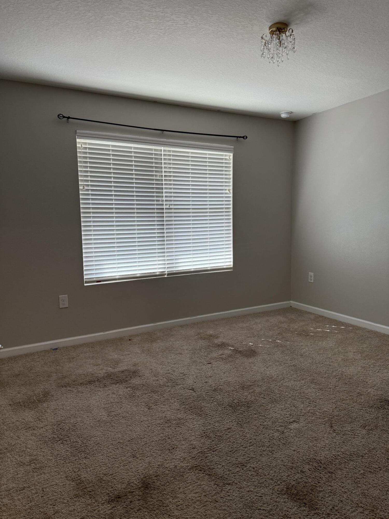 1004 Limpkin Street Crestview, FL 32539 - Photo 15 of 31 an empty room with a window