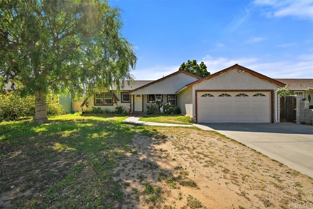 2602 Deodar Street Santa Ana, CA 92705 - Photo 1 of 1 a front view of a house with a yard