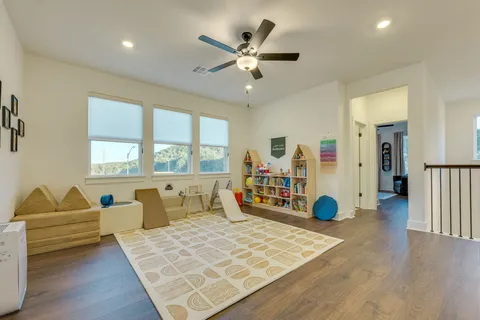 a bedroom with furniture and window