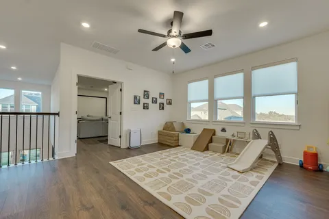 a bathroom with a sink toilet tub and shower