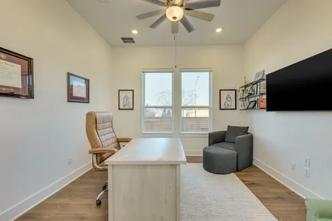 a view of a bathroom from a hallway