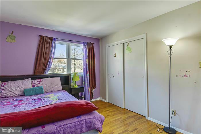 1307 Gresham Road Silver Spring, MD 20904 - Photo 16 of 22 a bedroom with a bed and a window