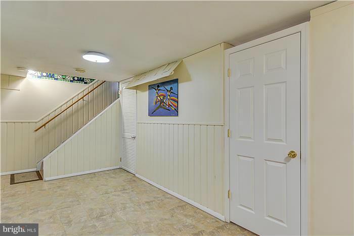 1307 Gresham Road Silver Spring, MD 20904 - Photo 19 of 22 a view of a hallway with staircase
