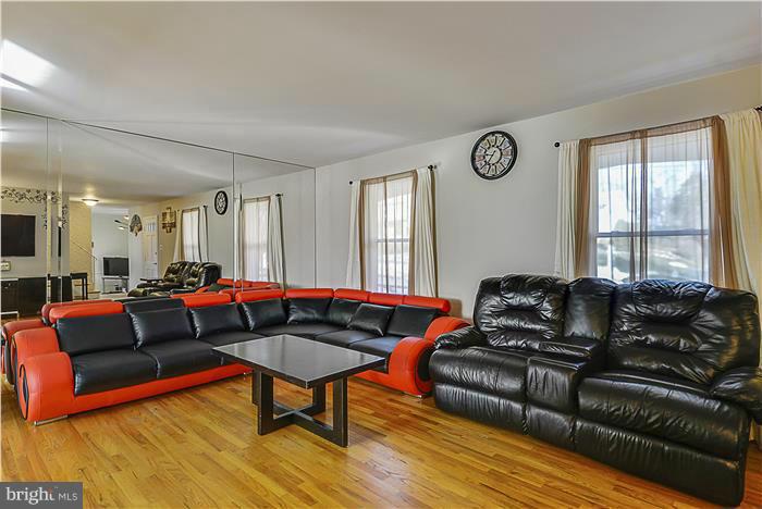 1307 Gresham Road Silver Spring, MD 20904 - Photo 5 of 22 a living room with furniture and a window