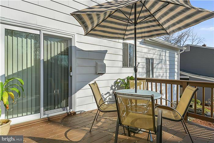 1307 Gresham Road Silver Spring, MD 20904 - Photo 9 of 22 a view of an chairs and table in the balcony